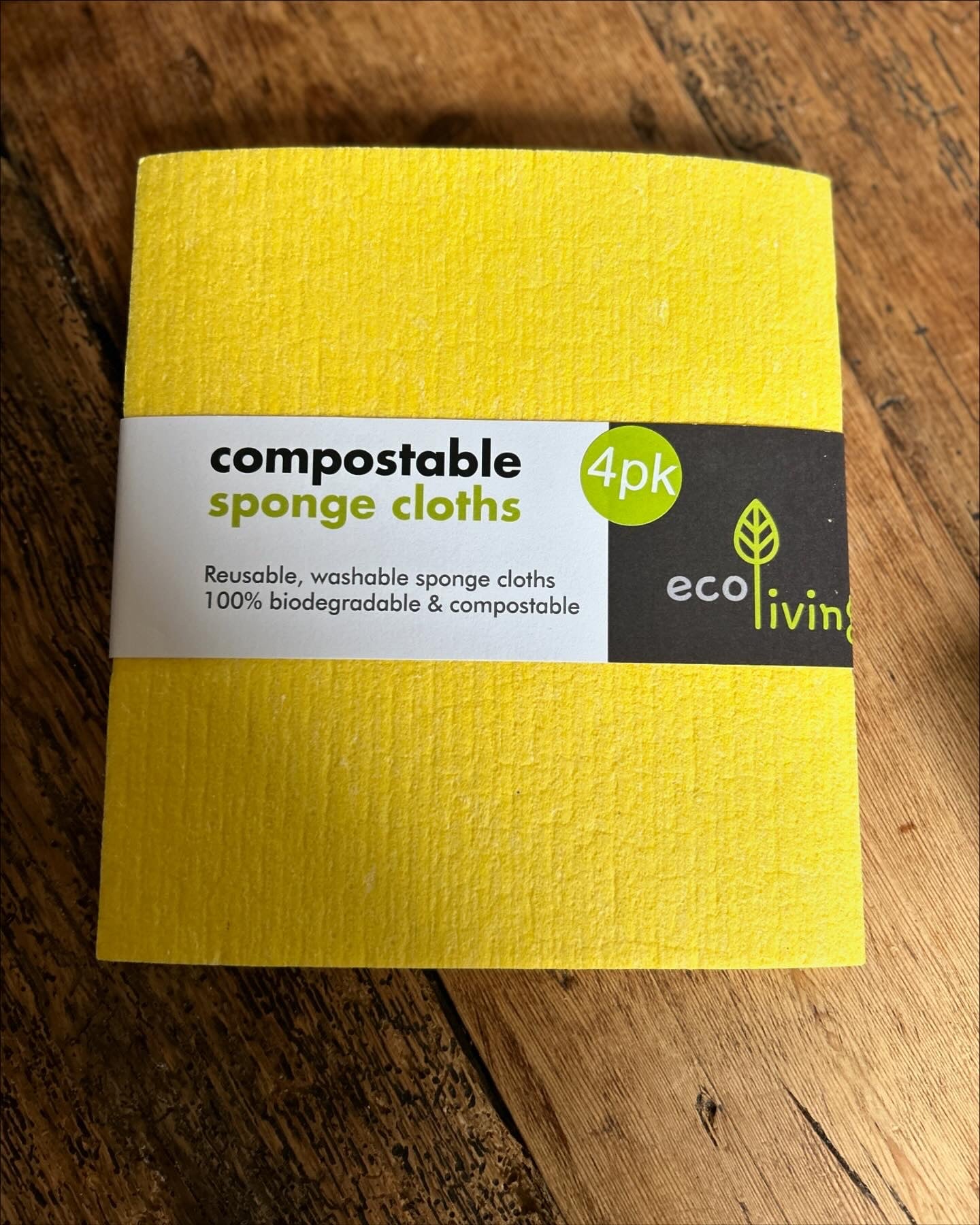 Compostable sponge cleaning cloths in yellow, 4-pack, biodegradable and eco-friendly, made from natural, renewable resources.